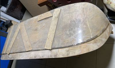 A large curved panel, cut and ready.